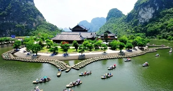 Limestone cliffs over the river at Trang An, Ninh Binh
